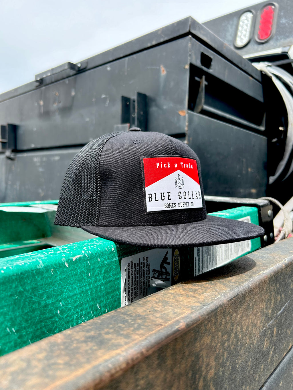 Red Label Flat Bill Trucker Hat